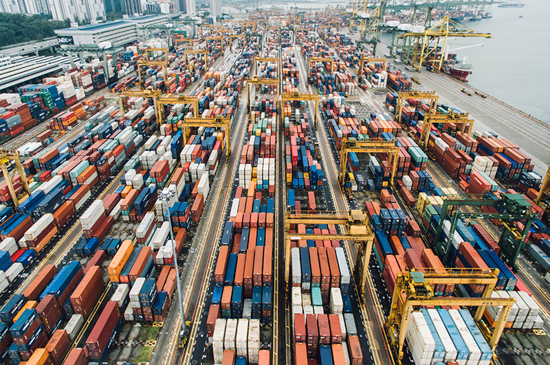 Long shot view of thousands of multi-coloured shipping containers